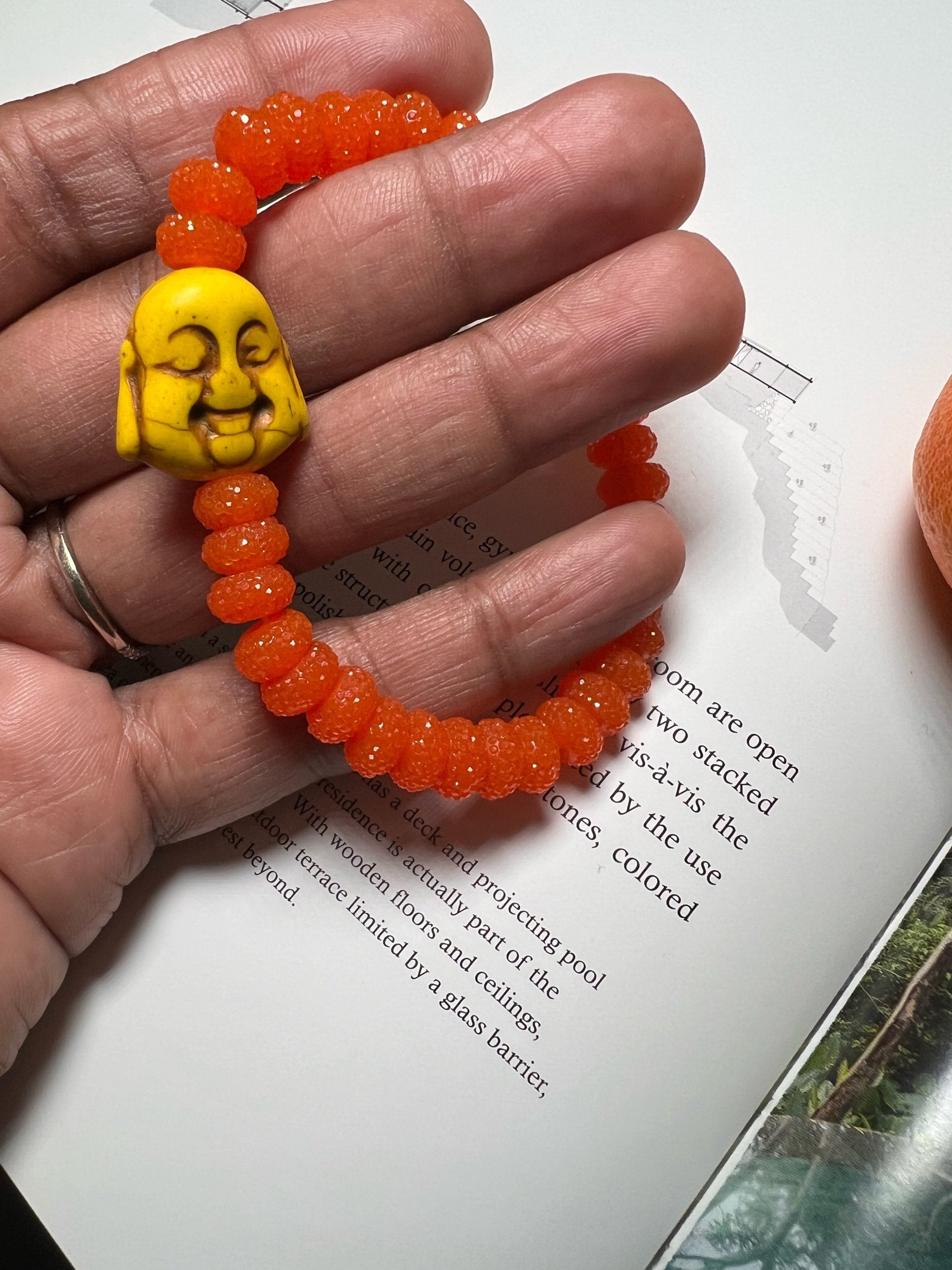Blood Orange sugar bead bracelet w/ lemon yellow buddha charm
